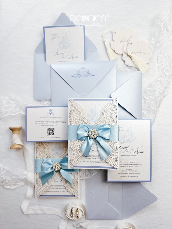 Luxurious and elegant light blue wedding invitation, with delicate laser engraved lace paper lining, luxurious light blue ribbon with gemstones, painted with beautiful castle image P241003