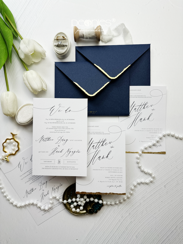 Luxurious and elegant wedding invitations, with navy blue envelopes, printed in gold metallic, invitations with deckled edge border P240916